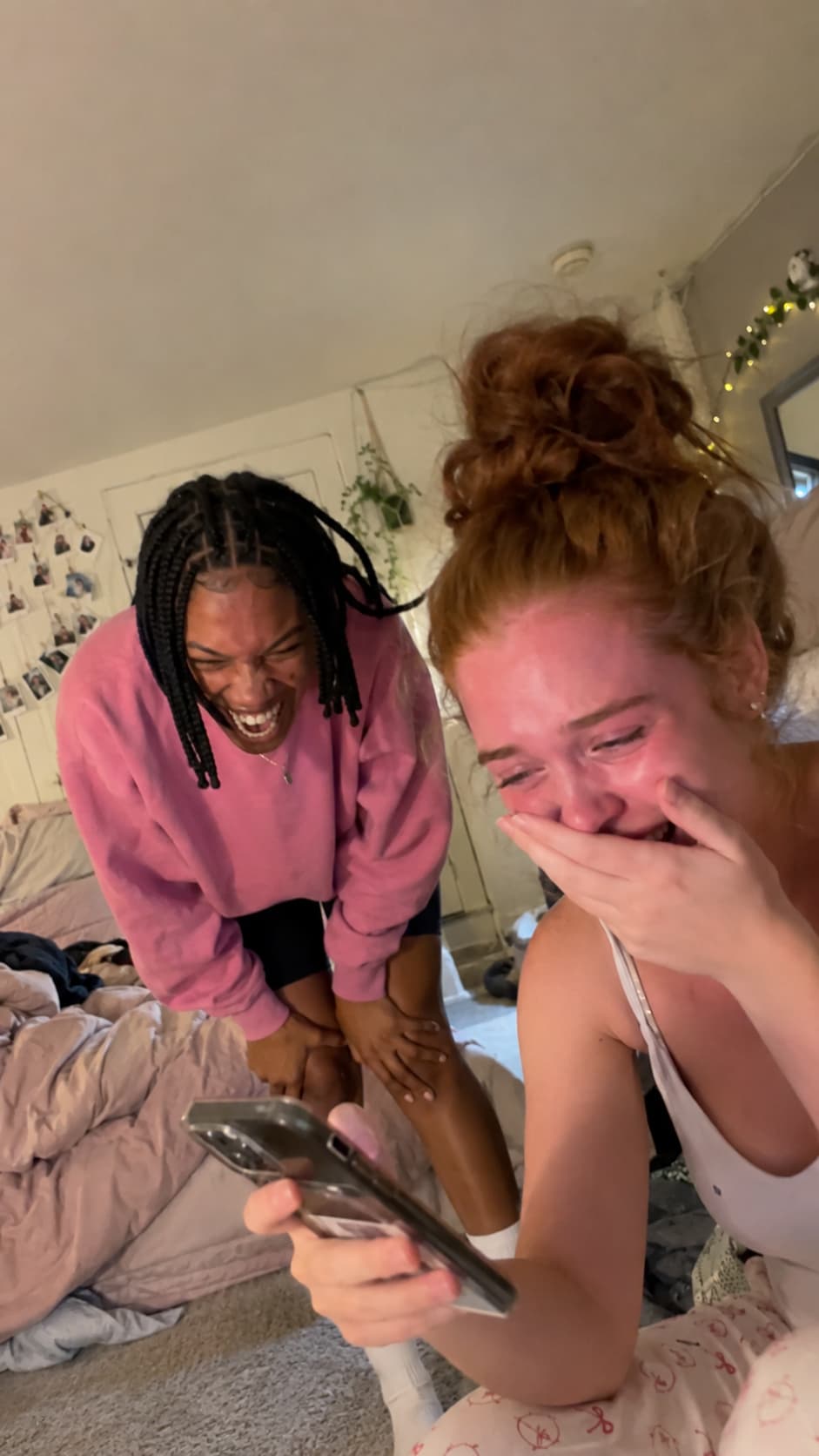 Friends laughing while listening to a custom song